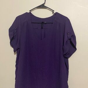 Woman’s purple blouse size large. Short sleeve